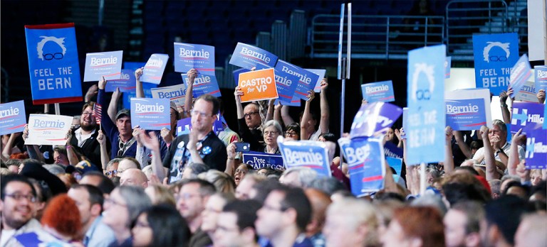 Texas Democratic delegates wave signs as the party's state convention wraps up the final day with a breakfast tribute to Lady Bird Johnson, voting on platforms and resolutions and declaring national delegates on Saturday, June 18, 2016. Factions of the delegates were still proponents of Bernie Sanders despite the majority of the group supporting Hillary Clinton. (Kin Man Hui/San Antonio Express-News)
